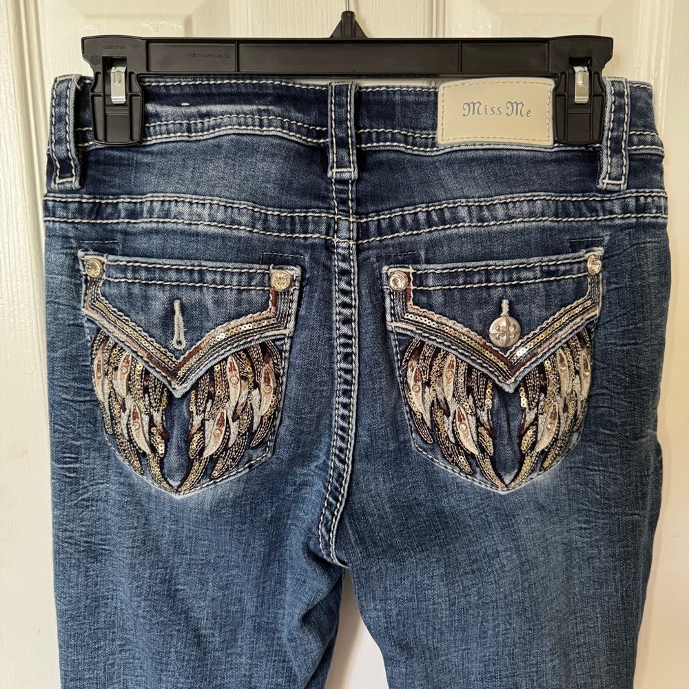 Miss Me Blue Mid Rise Jeans with Wing Embellishments